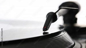 DJ needle on spinning turntable. Listening the music