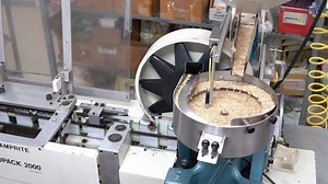 This is one of our high volume seed packaging machines in action. It, along with our others, has been running nearly non-stop! We appreciate everyone's patience as our dedicated staff continues to work diligently to process and ship your orders. | Territorial Seed Company