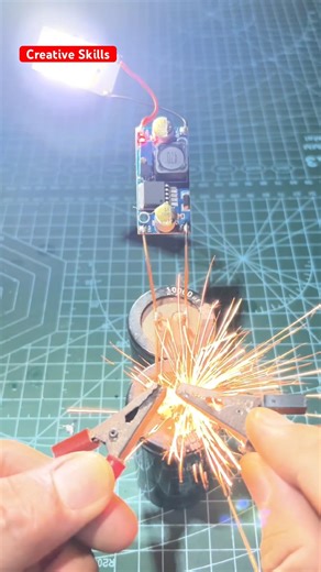 Charging and discharging a 63V 15000uF capacitor #shorts