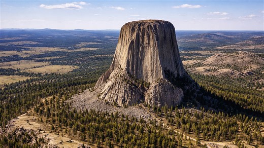 Devils Tower aerial view over Wyoming forest