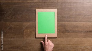 Man using a digital tablet and sending e-mails