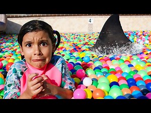 Ellie & Charlotte Ball Pit Shark Surprise in the Swimming Pool - Videos For Kids