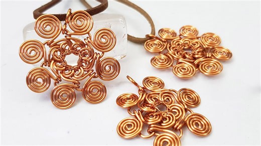 Flower pendant inspired by Egyptian coil from copper wire 480