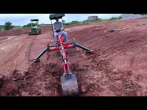 Harbor Freight Backhoe putting in a french drain.