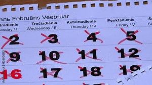 calendar pages falling down on table