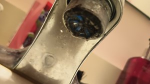 Plainville resident seeks help for 'black sludge' drinking water