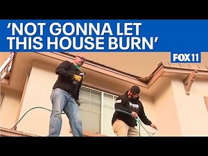 Castaic Fire: Homeowners race to protect home from brush fire