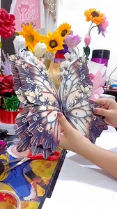 How to turn printed Butterfly cut-out into 3D. You can use this for your bouquet or as home decor.#fyp #foryouシ#bouquet #bouquets #butterfly #tutorial #tutorials #tutorialvideos #butterflybouquet #diy #craft #crafts #crafters #craftersoftiktok #craftersgonnacraft #craftersoffacebook | Wear Thaleia