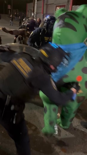 An ICE agent was seen pepper-spraying the rear end of a Portland protester wearing a frog costume, apparently aiming for the air intake valve. "This could have been really dangerous," the person who filmed the video wrote on X. | New York Post Trending Now