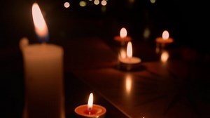 Multiple Candles, Hand, Candle Flame. Free Stock Video