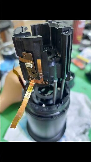 Panasonic Lumix lens repair Lumix 100-400 repair and adjustment