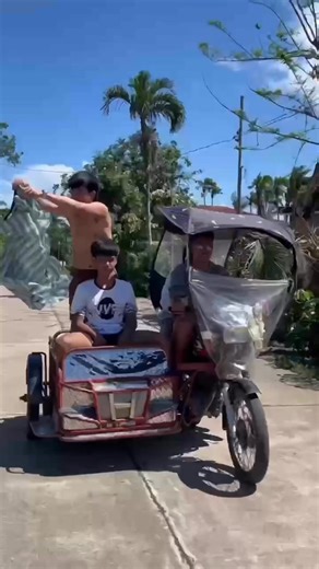 Boss Janong on Instagram: "I gave my buddy a VIP full service haircut while we were riding a motorcycle with a sidecar. 🤣"