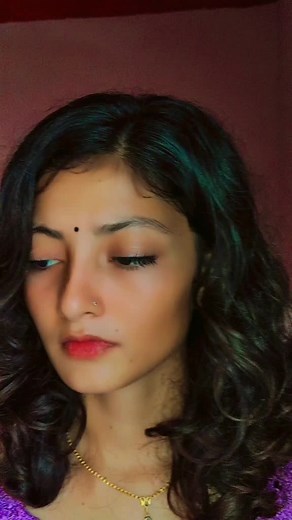 Exploring Fashion: Styling Dark Curly Hair with Purple