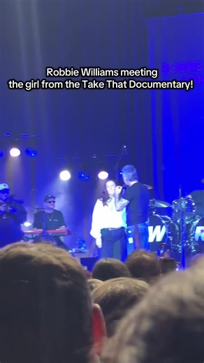 Robbie Williams Reunites with Take That Documentary Star