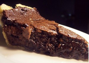 THIS CHOCOLATE FUDGE PIE IS SIMPLE, DELICIOUS & CREAMY! YOU'LL WANNA MAKE MORE THAN ONE!! Fudge Pie Recipe 3 eggs 1 1/2 cups sugar 1 tbsp flour 1/4 cup cocoa powder 1 stick of butter (melted) 1 tsp vanilla 1 frozen deep dish pie shell Step 1... beat eggs then add sugar & flour & mix well. Step 2... In a separate bowl mix cocoa powder & melted butter. Step 3... add cocoa & butter mixture to egg mixture & mix well then add vanilla & mix. Preheat oven to 350° Cook for 45min Let cool for 30min Happy