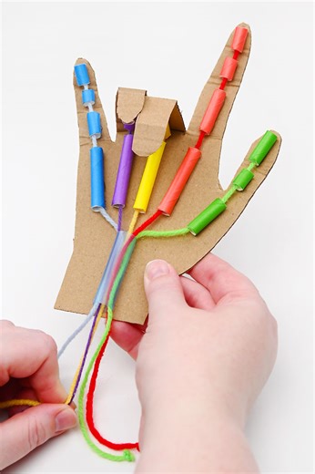 48K views · 147 reactions | Made with just cardboard, drinking straws, and yarn, this easy STEM craft is a fantastic way to introduce kids to how tendons and muscles work. The straws act like joints, and when you pull the yarn — the fingers move! It’s interactive, educational, and super cool to play with. https://onelittleproject.com/diy-robot-hand/ | One Little Project | Facebook