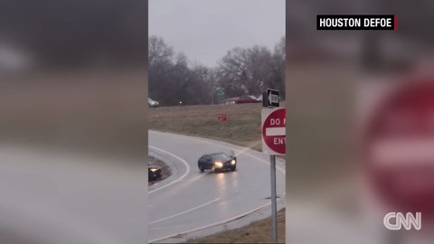 Driver jumps from car sliding on ice