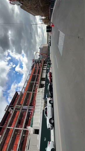 New soccer stadium spraying monoke on new structure steel fireproofing