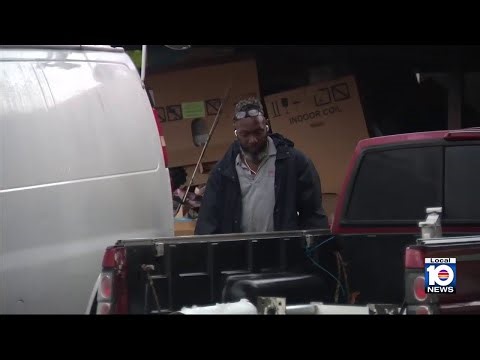 Grieving father returns after boy and dog die in house fire