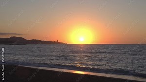 Beautiful sunset at La Malagueta Beach in Malaga, capital of the Province of Malaga, in the autonomous community of Andalusia, Spain