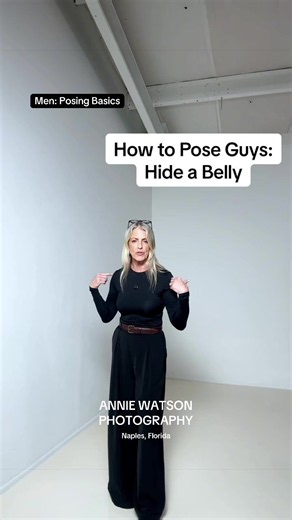 Guys need a posing plan too, and it starts before the camera even comes up. For men, I like them to take up space. Look away, then look back at me right as the shutter goes. That small reset gives you a genuinely fresh expression every time, whether that's a real smile or a serious, strong face. Both work. If you're carrying any weight in your midsection, your angle matters more than almost anything else. Facing the camera straight on accentuates it. Facing all the way sideways accentuates it ju