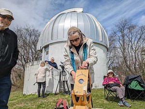 Greenwich observatory's eclipse watch drew stargazers in awe at the heavens: 'Keeps us humble.'