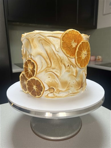 Lemon meringue cake for my Dads birthday. His favourite AC/DC for the vibes Lemon cake with lemon buttercream, lemon curd, blueberry mousse and crispy meringue. #homebaking #lemoncake #swissmeringue