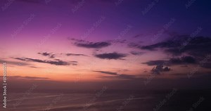 Timelapse of sunset on sea with clouds. Fast time movement Stock Video