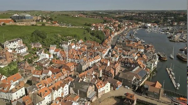River Esk and Whitby Old Town buildings, North Yorkshire, England