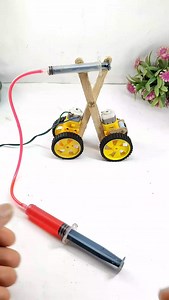 YT SHIVAM on Instagram: "Foldable Car Mechanism | Simple Hydraulic Science Project Discover how to make a simple foldable car using a hydraulic mechanism. This easy DIY science project shows how hydraulic pressure works to move and fold objects. Using syringes, pipes, motors, and wheels, this car can fold and unfold with the power of fluid pressure. In this project, we use basic materials like wooden sticks, toy car motors, syringes, and flexible pipes. The hydraulic system helps to lift and fol