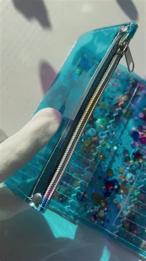 Cool blue, in my opinion, is not just a color. It’s a mood for 2026. This wallet was born from the need to carry everything – and still look unreal. It’s so spacious it’s almost scary (yes, receipts, cards, coins, secrets… all welcome). I layered cool blue vinyl with another vinyl layer and filled the space between them with my signature Crazy mix – glitter, confetti and sequins dancing freely inside. Every move creates a different sparkle. No two pieces ever look the same. And yes, it can be cu