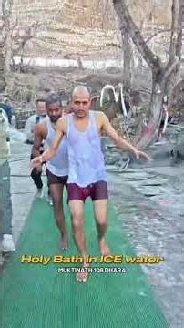 holy bath in ice water muktinath mustang nepal