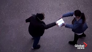 Candid camera captures apparent parking lot mask sales