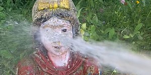 Restoring chipped snow white lawn statues