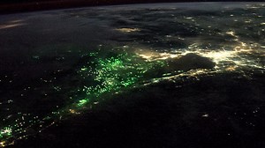 What are these strange green lights over the ocean? | Science Channel