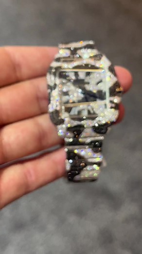 Black and white diamond cartier watch