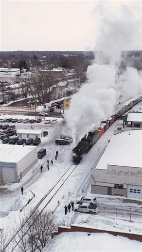 Craig Hensley on Instagram: "PM 1225 shoving their train into @steamrailroadinginstitute to load passengers for Sundays 10am run. There sure was a crowd gathered to watch this amazing piece of history! #railroad #railway #train #rail #drone #reels #fblifestyle #reelsvideo #snow #winter #december"