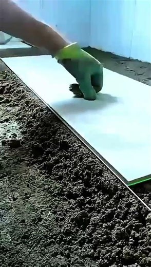 Perfect tile layout made EASY! 🔥#laserlevel #tileinstallation #floortiles #dovoh #renovationtips