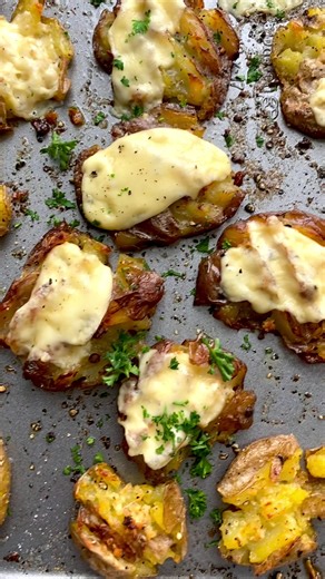 Crispy Cheesy Smashed Potatoes 🥔 🧀 https://www.lecremedelacrumb.com/crispy-oven-roasted-smashed-potatoes/