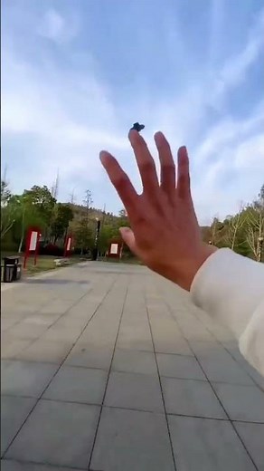 Mini LED UFO Drone: 360° Spins & Hand Gesture Control!