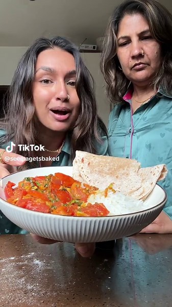 One of my favourite curries and probably the easiest one you will ever make. 8 Garlic Cloves 1 Kg Tomatoes ½ Tsp Cumin Seeds 2 Tsp Chilli Powder 1 Tsp Ground Coriander 1 Tsp Ground Cumin ½ Tsp Turmeric Handful Of Coriander Roughly chop the garlic and chop up the tomatoes into large chunks. Finely chop the coriander, including the stems. Pour two large glugs of oil in a large pan, heat to high heat. Fry the cumin seeds until they start to pop. Add in the garlic and cook for 30 seconds until light