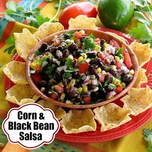 Corn and black bean salsa is THE BEST! It's not just for chips either. Top chicken or fish, make a rice bowl or add to tacos too. Use our trick for fresh corn in minutes! Get the recipe ==> https://www.dinner-mom.com/corn-and-black-bean-salsa/ | The Dinner-Mom