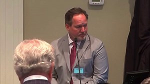 Forensic engineer Mike Sutton recreated crime scene to decipher line of fire.