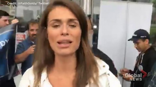Faith Goldy presents petition outside mayoral debate at Corus Quay