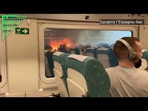 VIDÉO - En Espagne, un train s'arrête au milieu d'un incendie.