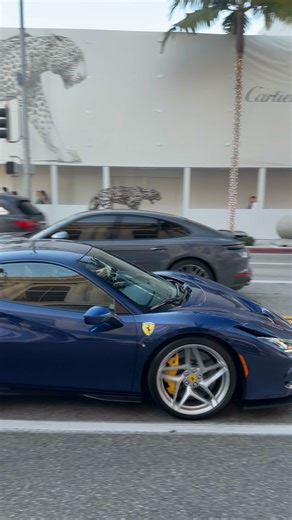 A TDF Blue Ferrari F8 Tributo cruising down Rodeo shows how sharp Maranello’s mid-engine design still feels. With a current market value around $330,000–$360,000, it remains one of Ferrari’s strongest modern performers. The color pops especially hard against the storefronts, making it an instant attention-grabber. #ferrari #carspex #fblifestyle | CarSpex