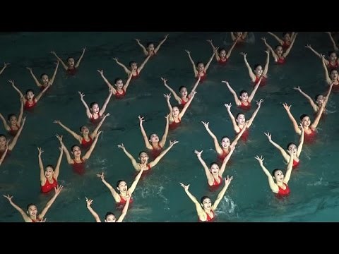 Swimmers perform in synchronized swimming gala in Pyongyang