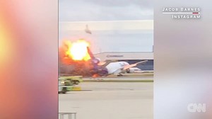 Video shows a fireball exploding out of damaged aircraft after a FedEx cargo plane caught fire on a runway at Fort Lauderdale International Airport, according to the FAA. The airport closed for several hours due to the incident. http://cnn.it/2eXdQRg | CNN