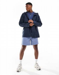 ASOS DESIGN shower resistant rubberised rain jacket in navy | ASOS