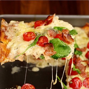 It's so easy to make a thin crust white pizza that's low carb and gluten free. With this recipe, you don't even need to bother rolling out the crust. Get the full recipe: https://lowcarbyum.com/low-carb-pizza-crust-white-sauce/ | Low Carb Yum